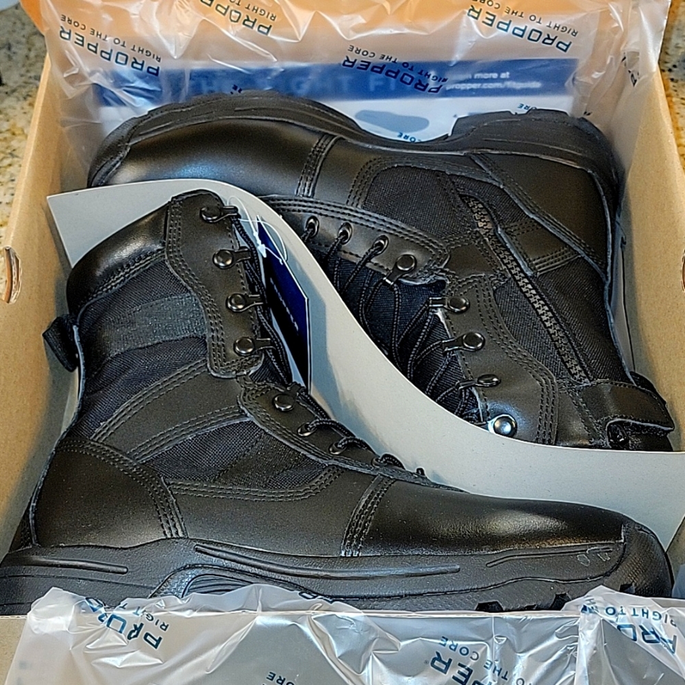 Brand new in box Propper men black boots. Size 10W.